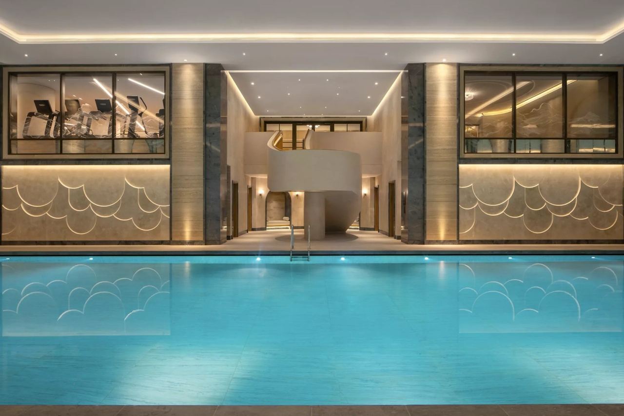 The 20-metre pool under a double-height ceiling at Guerlain Spa, Raffles London at The OWO